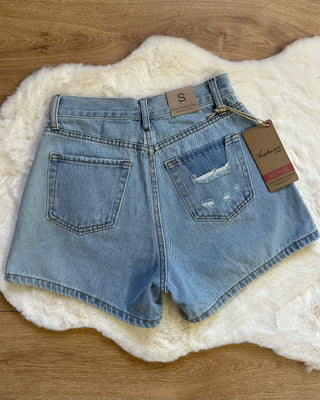 Short denim con bottoni esterni