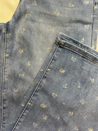 Jeans palazzo con fiorellini gialli