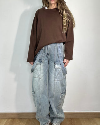 Jeans cargo vita alta con bretelle