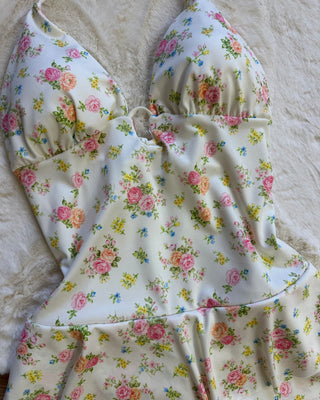 Tutina bianca floreale volant