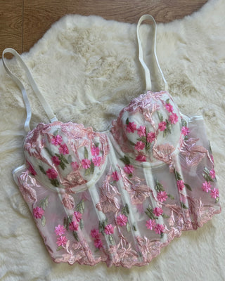 Corpetto bustier bianco con ricami floreali rosa