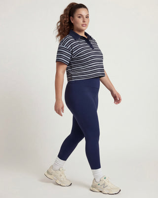 Polo crop a righe multicolori con fondo blu 65% cotone