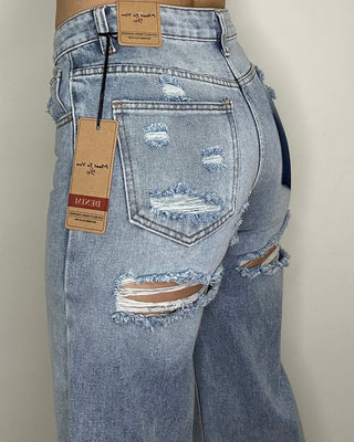 Jeans wide leg con strappi retro