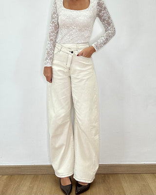 Ballon jeans avorio con chiusura asimmetrica