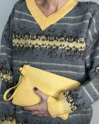 Pochette vera pelle con manico e tracolla