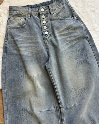 Baggy jeans con bottoni esterni