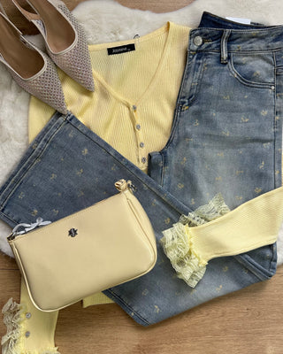 Jeans palazzo con fiorellini gialli