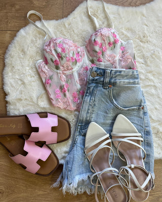Corpetto bustier bianco con ricami floreali rosa