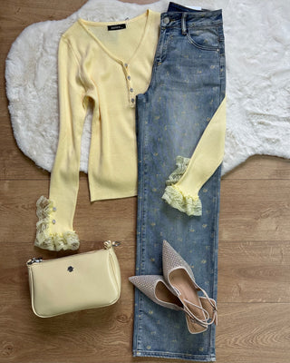 Jeans palazzo con fiorellini gialli