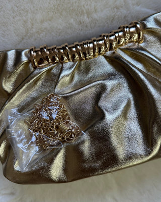 Pochette dorata con tracolla