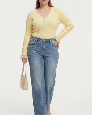 Jeans palazzo con fiorellini gialli