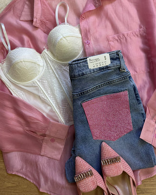 Wide leg con tasche rosa gioiello sul retro